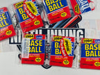 Collection of 1984 Fleer Baseball trading card packs on a white background