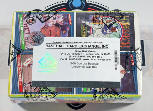 A sealed 1986 Donruss Baseball card wax box shown from the front, with a white paper label reading 'BASEBALL CARD EXCHANGE, INC.' placed across the center.
