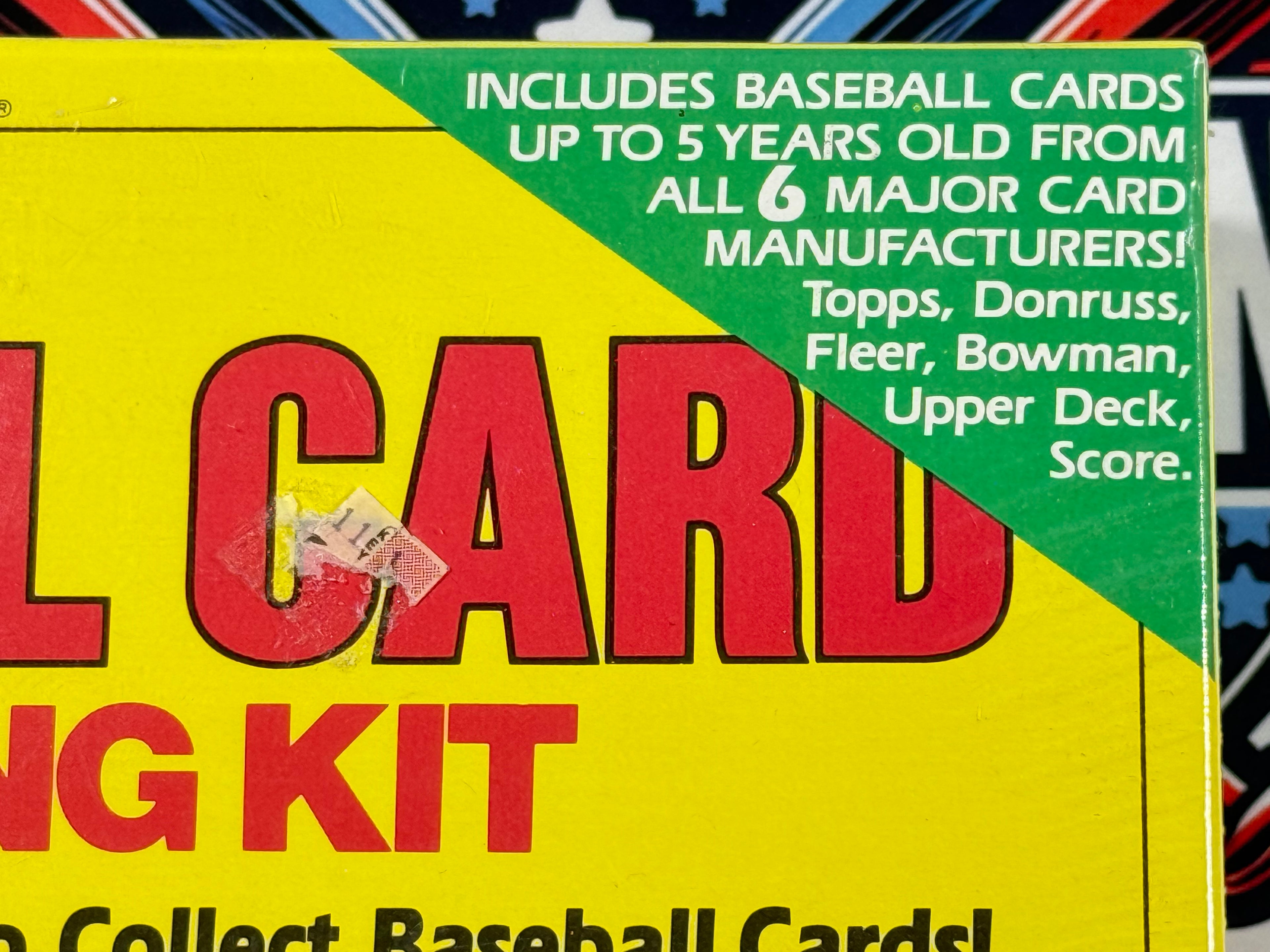 Baseball card collecting kit packaging with text about card manufacturers on a yellow and green background.