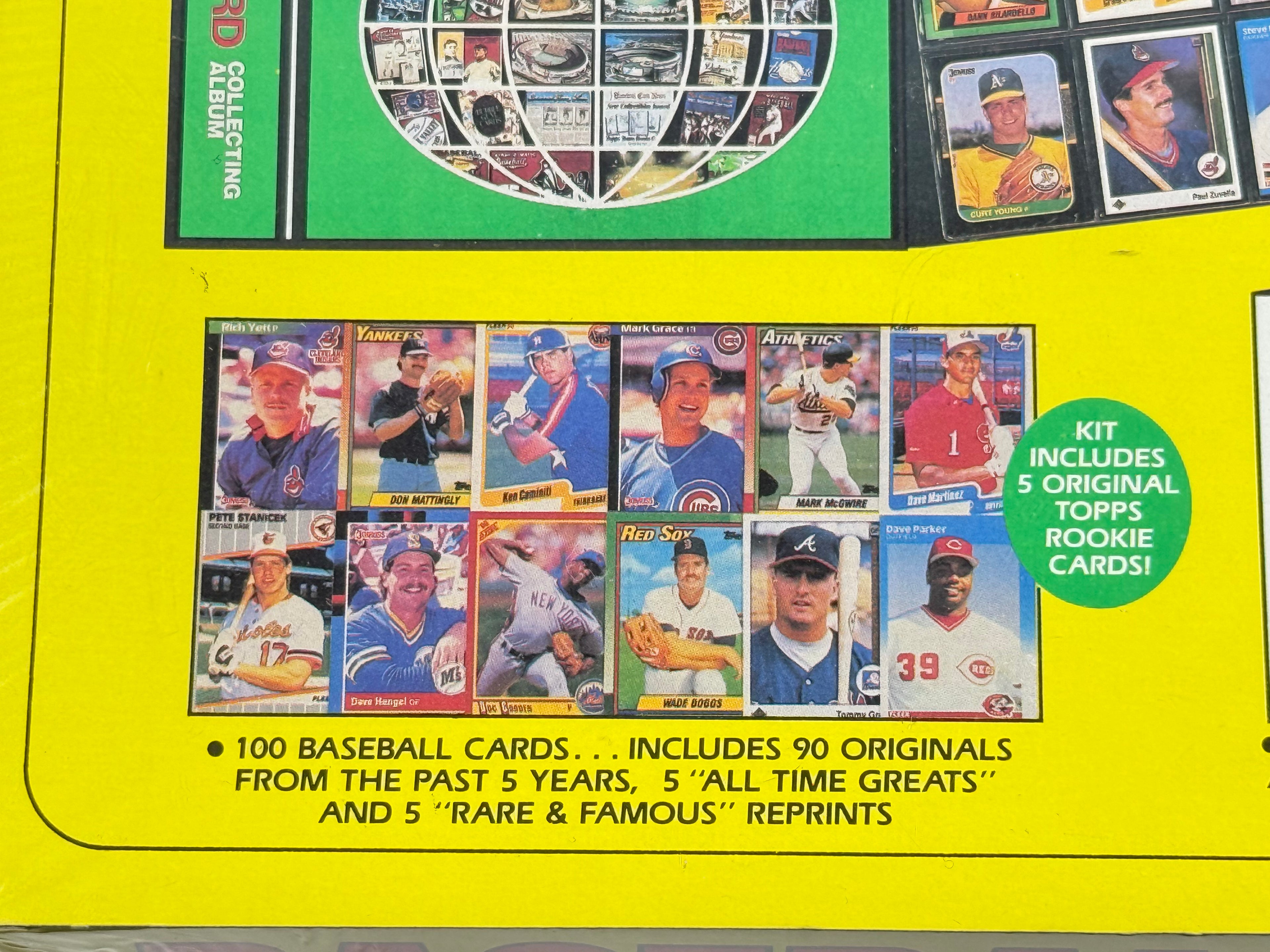 Baseball card collection kit with various cards displayed on a yellow background