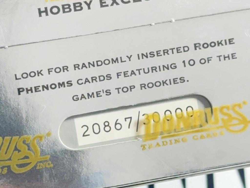 Baseball trading card pack with Panini logo and serial number