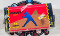 A sealed Pinnacle Hobby baseball trading card booster pack for Series One, featuring a red, black, and blue design with a baseball player silhouette, photographed on a white surface with a baseball-themed mat underneath.