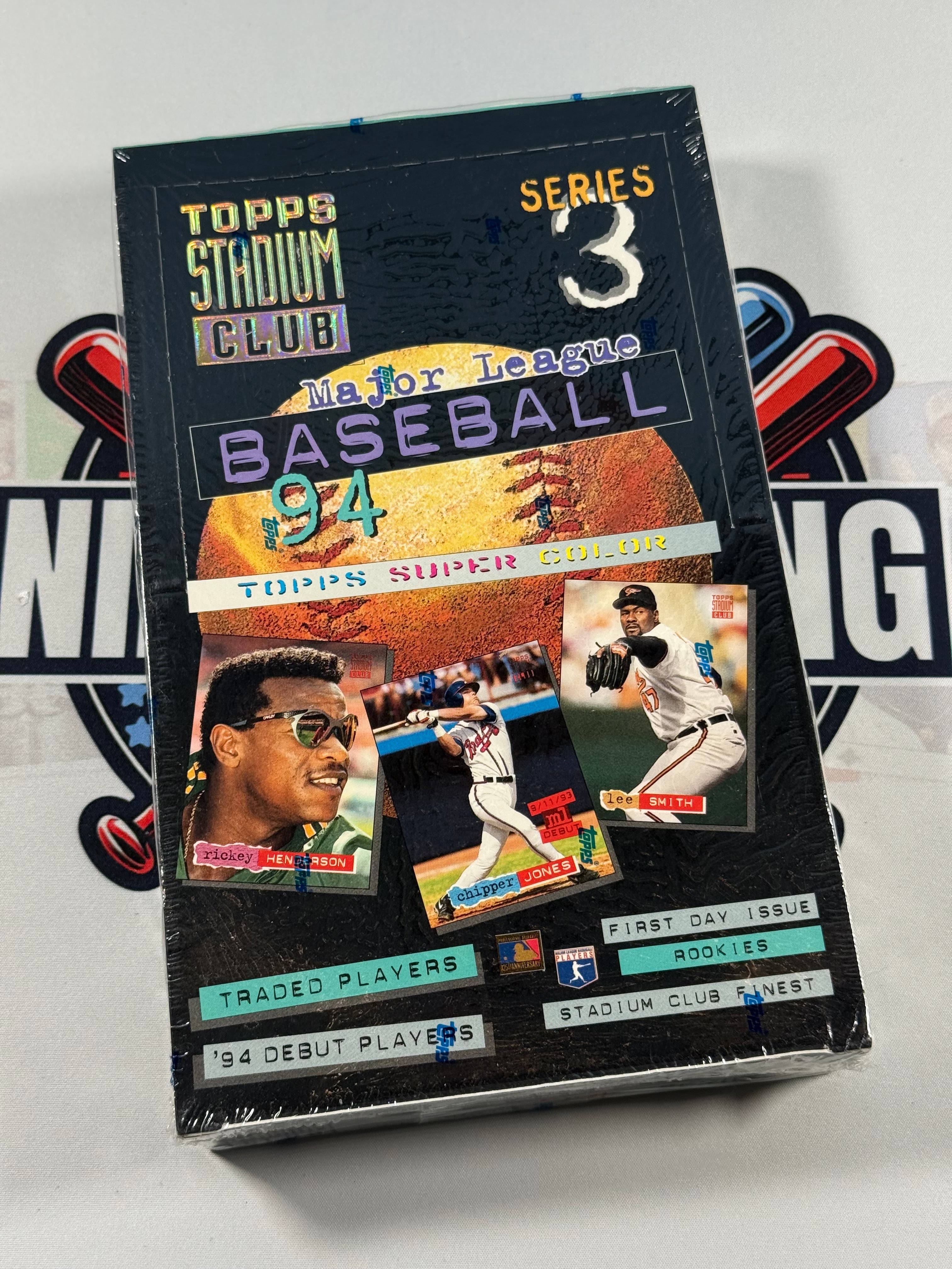 Collection of baseball trading cards in a Topps packaging on a white background