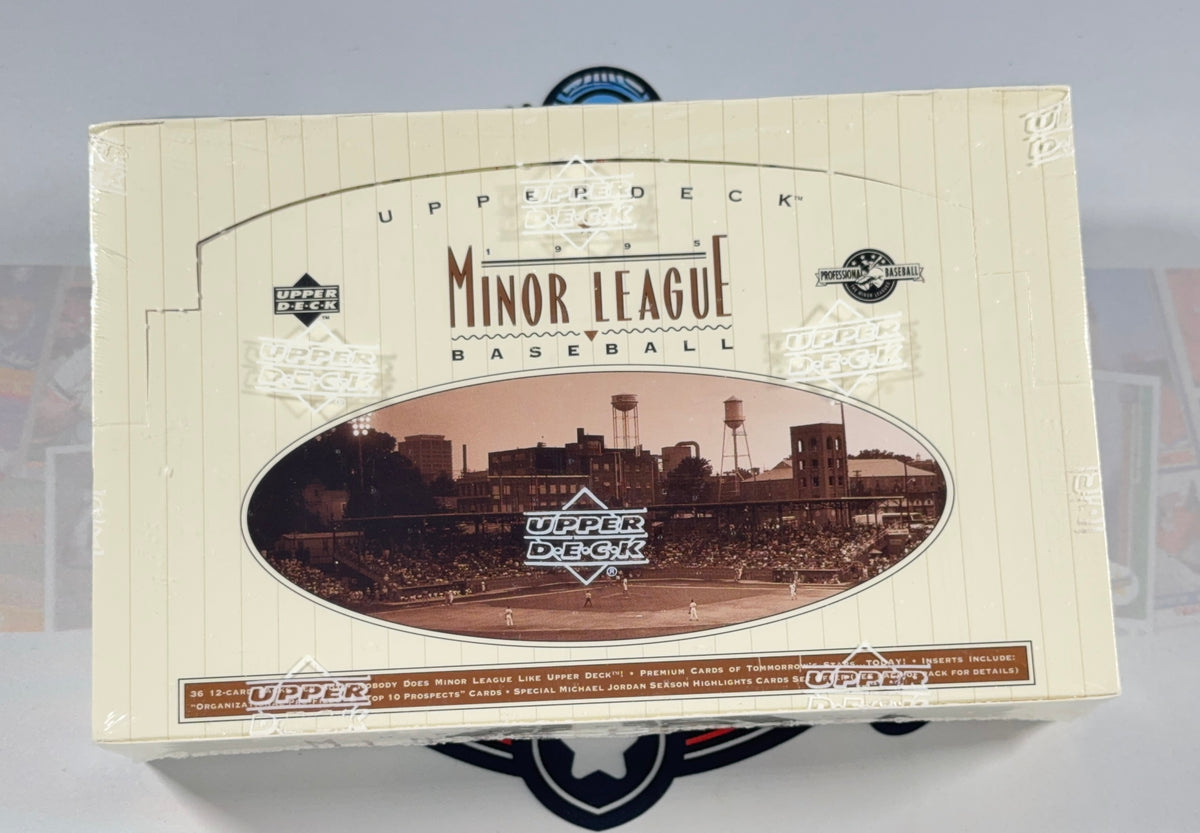 A sealed 1995 Upper Deck Minor League Baseball trading card deck box, featuring a cream pinstripe design with a sepia-toned oval stadium photo and multiple Upper Deck logos.