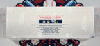 A sealed plastic-wrapped box of 2024 Topps Pinch Barrels baseball trading cards, showing the back panel with product details and team logos, placed on a baseball-themed mat.