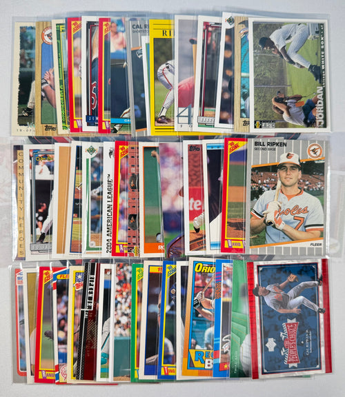 Collection of baseball trading cards displayed on a white background