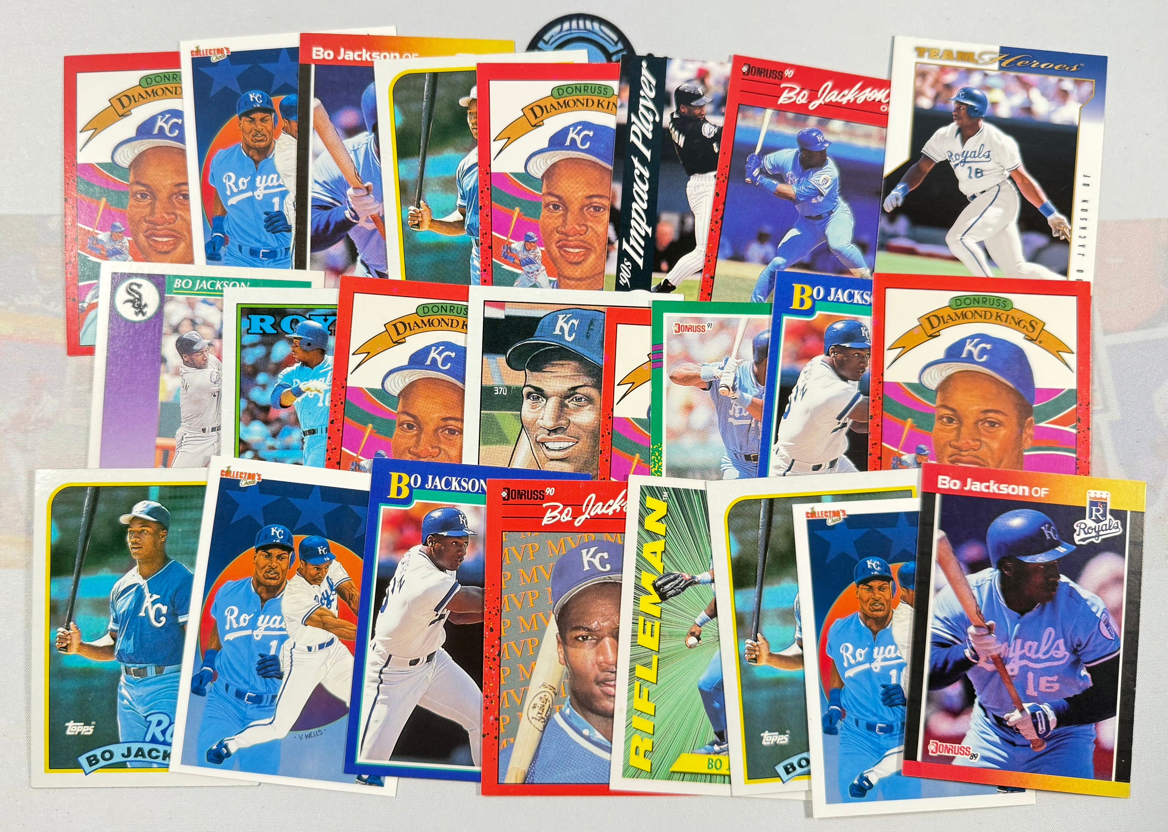 Collection of baseball trading cards featuring various players on a white background