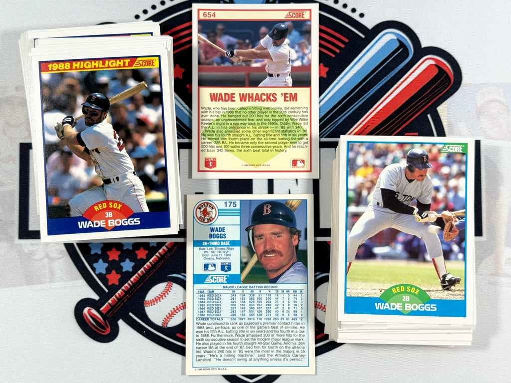 Collection of baseball trading cards featuring Wade Boggs on a sports-themed background.