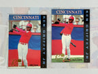 Two trading cards of Ken Griffey Jr. from Cincinnati on a light gray background