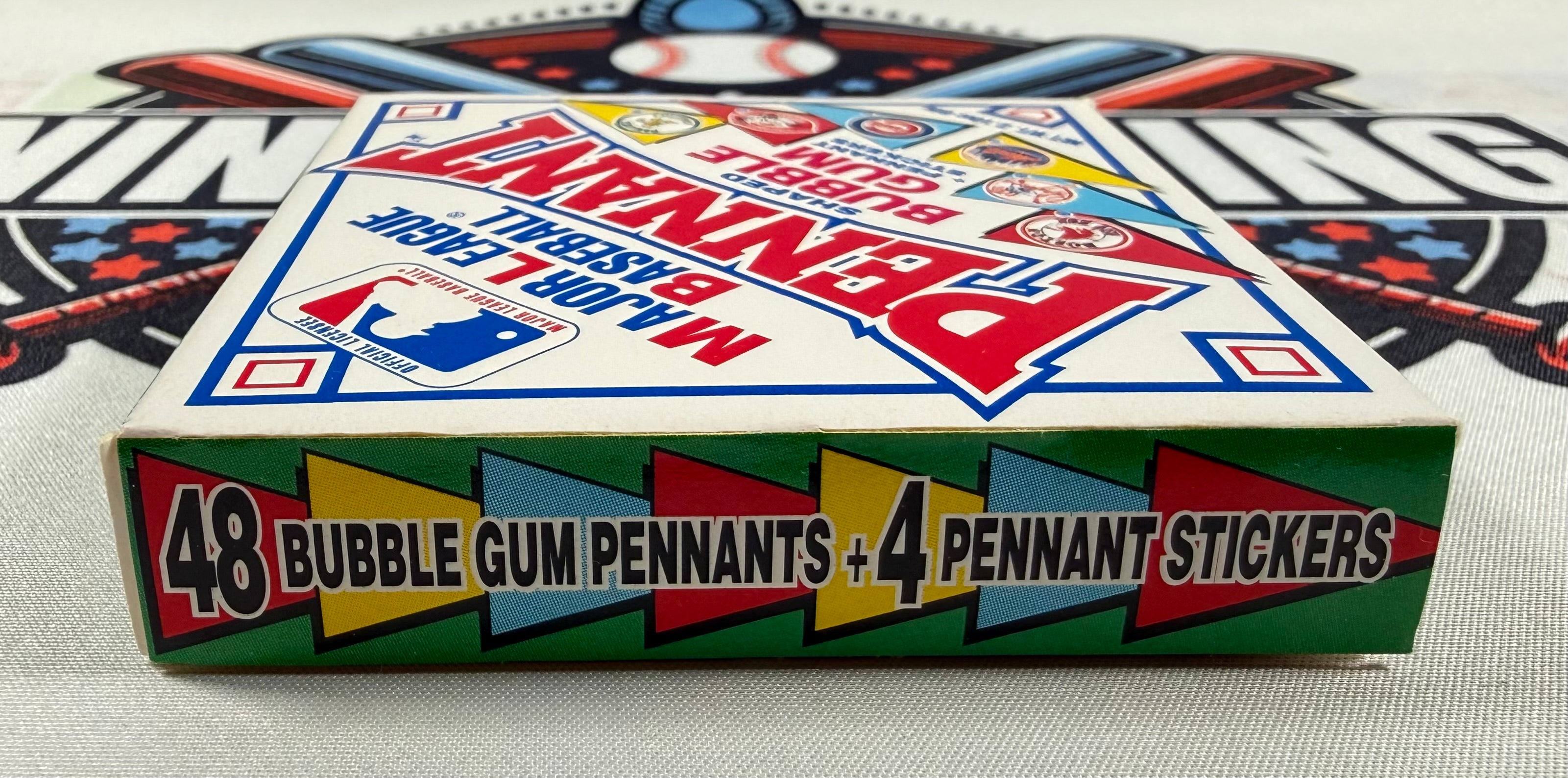 Box of bubble gum pennants and stickers with colorful design