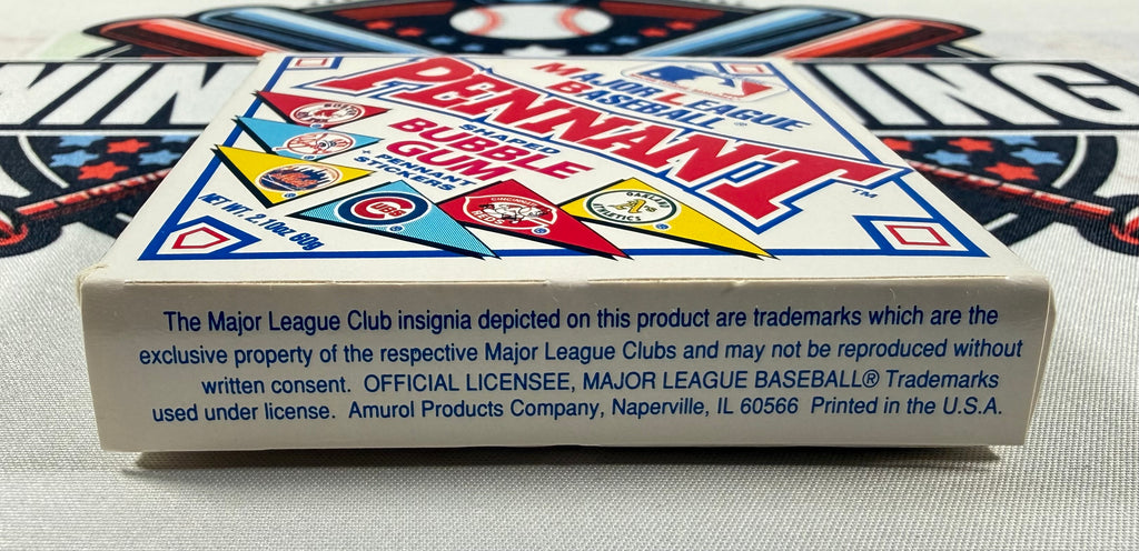 Close-up of a box with 'Pennant' branding and baseball graphics.