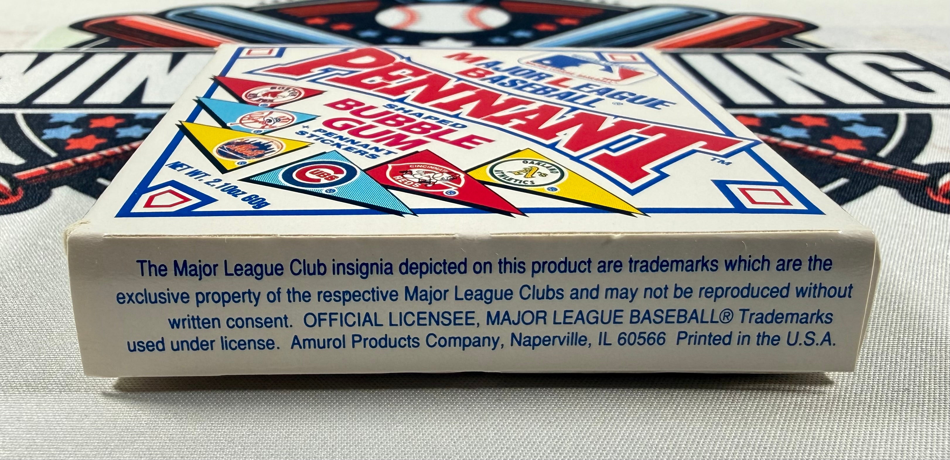 Close-up of a box with 'Pennant' branding and baseball graphics.